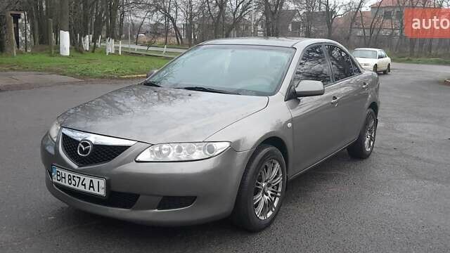 Серый Мазда 6, объемом двигателя 1.8 л и пробегом 290 тыс. км за 3500 $, фото 1 на Automoto.ua