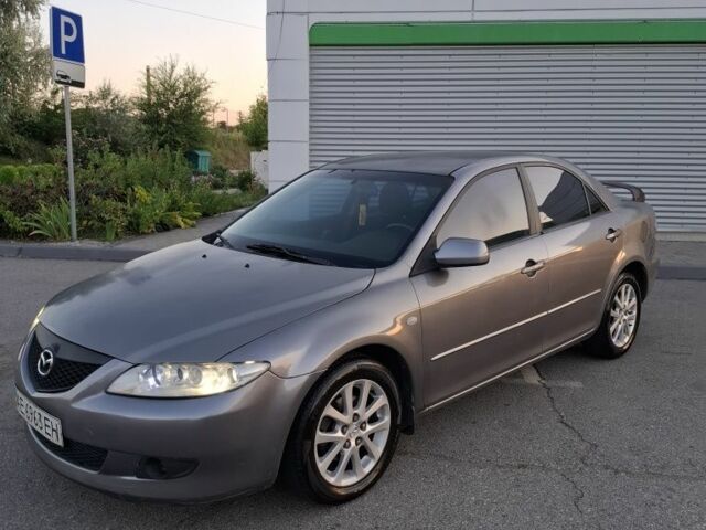 Серый Мазда 6, объемом двигателя 2 л и пробегом 295 тыс. км за 2710 $, фото 1 на Automoto.ua