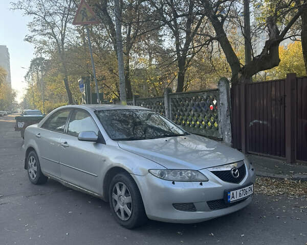 Сірий Мазда 6, об'ємом двигуна 2.3 л та пробігом 518 тис. км за 2100 $, фото 1 на Automoto.ua