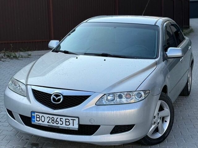 Серый Мазда 6, объемом двигателя 2 л и пробегом 270 тыс. км за 2900 $, фото 1 на Automoto.ua