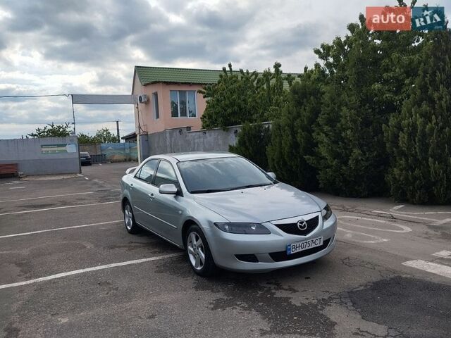 Серый Мазда 6, объемом двигателя 2 л и пробегом 257 тыс. км за 2800 $, фото 1 на Automoto.ua