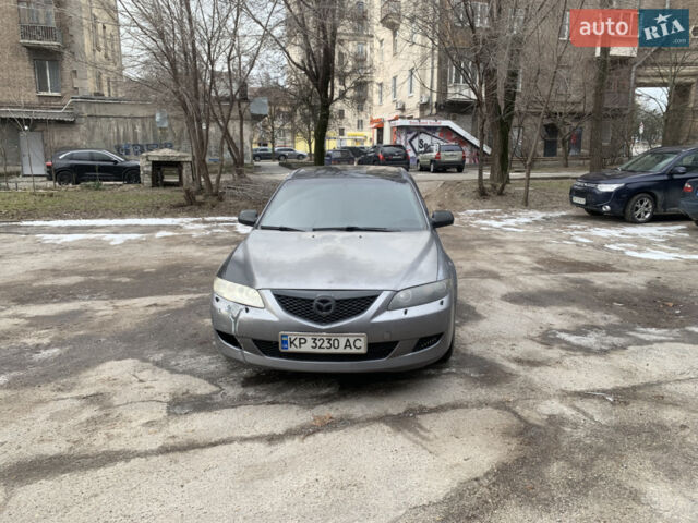 Серый Мазда 6, объемом двигателя 2 л и пробегом 313 тыс. км за 3000 $, фото 1 на Automoto.ua