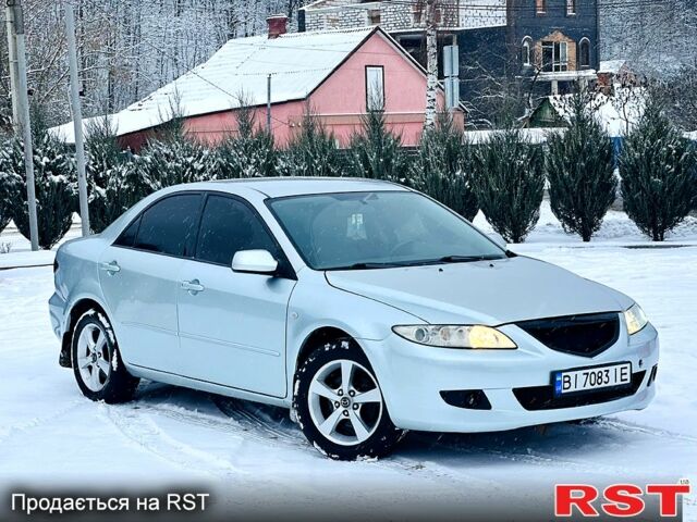 Серый Мазда 6, объемом двигателя 2 л и пробегом 250 тыс. км за 3100 $, фото 1 на Automoto.ua