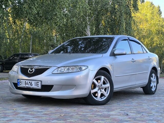 Серый Мазда 6, объемом двигателя 2 л и пробегом 243 тыс. км за 3900 $, фото 1 на Automoto.ua
