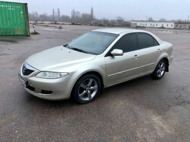 Серый Мазда 6, объемом двигателя 2 л и пробегом 547 тыс. км за 2400 $, фото 1 на Automoto.ua