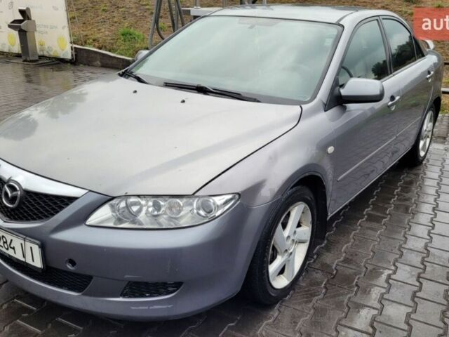 Серый Мазда 6, объемом двигателя 2 л и пробегом 234 тыс. км за 4600 $, фото 1 на Automoto.ua