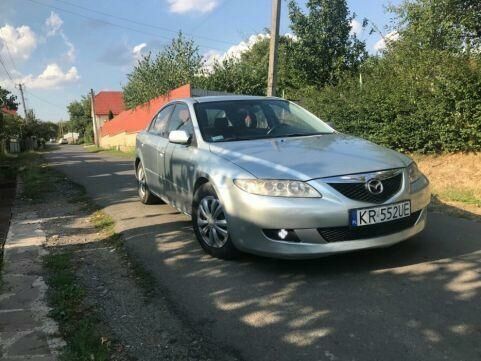 Серый Мазда 6, объемом двигателя 2 л и пробегом 317 тыс. км за 75000 $, фото 1 на Automoto.ua