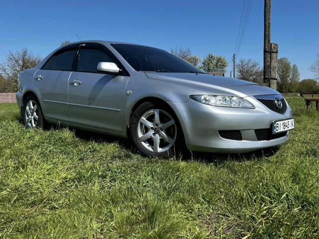 Серый Мазда 6, объемом двигателя 2 л и пробегом 250 тыс. км за 4100 $, фото 1 на Automoto.ua
