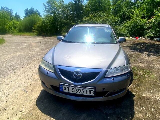Серый Мазда 6, объемом двигателя 2 л и пробегом 300 тыс. км за 1600 $, фото 1 на Automoto.ua