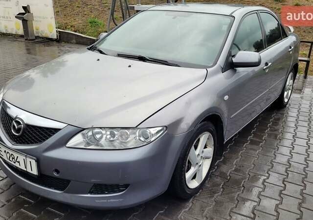 Сірий Мазда 6, об'ємом двигуна 2 л та пробігом 234 тис. км за 4900 $, фото 1 на Automoto.ua