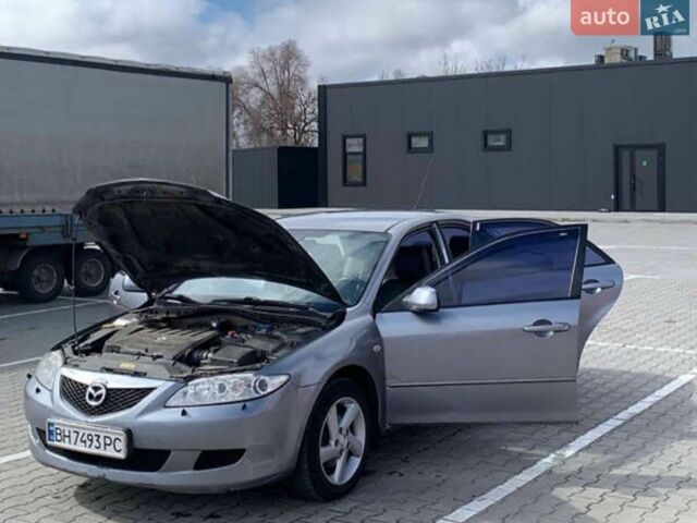 Серый Мазда 6, объемом двигателя 2 л и пробегом 311 тыс. км за 3750 $, фото 1 на Automoto.ua