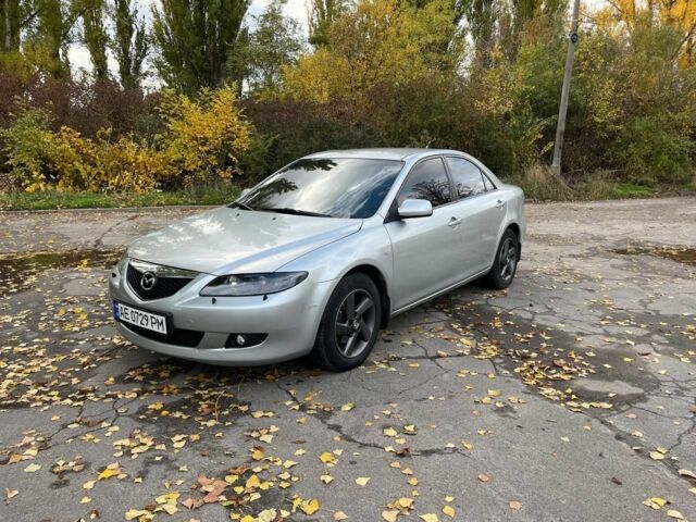 Серый Мазда 6, объемом двигателя 2 л и пробегом 255 тыс. км за 4500 $, фото 1 на Automoto.ua