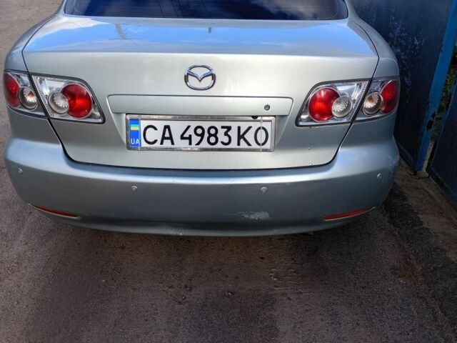 Серый Мазда 6, объемом двигателя 2 л и пробегом 273 тыс. км за 3500 $, фото 1 на Automoto.ua