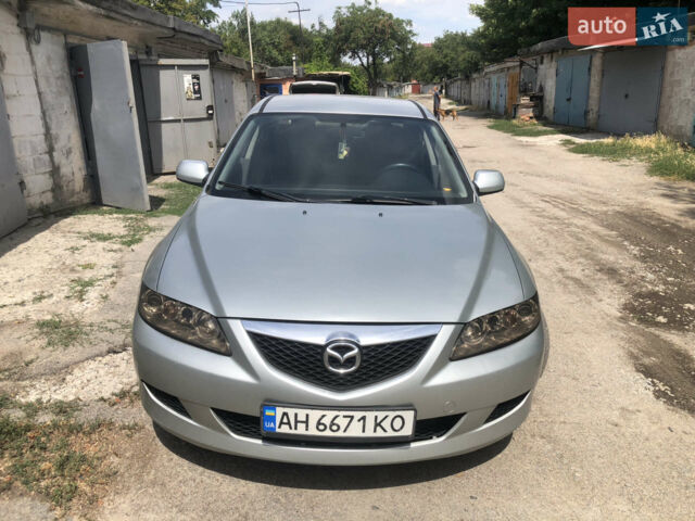 Серый Мазда 6, объемом двигателя 2 л и пробегом 290 тыс. км за 3100 $, фото 1 на Automoto.ua