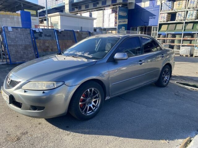 Серый Мазда 6, объемом двигателя 2 л и пробегом 320 тыс. км за 2450 $, фото 1 на Automoto.ua