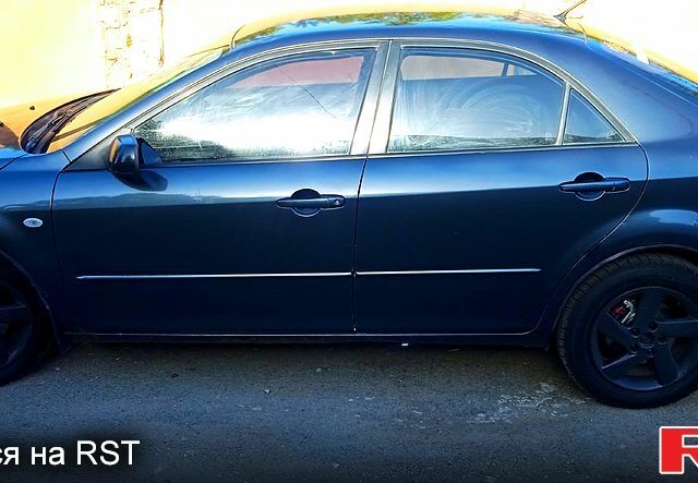 Серый Мазда 6, объемом двигателя 2 л и пробегом 222 тыс. км за 4300 $, фото 1 на Automoto.ua