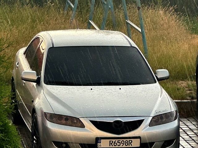 Серый Мазда 6, объемом двигателя 2 л и пробегом 333 тыс. км за 3500 $, фото 1 на Automoto.ua