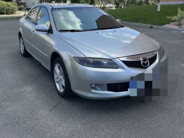 Серый Мазда 6, объемом двигателя 2 л и пробегом 240 тыс. км за 1000 $, фото 1 на Automoto.ua