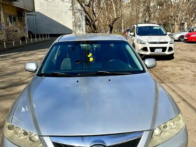 Серый Мазда 6, объемом двигателя 1.8 л и пробегом 300 тыс. км за 2800 $, фото 1 на Automoto.ua