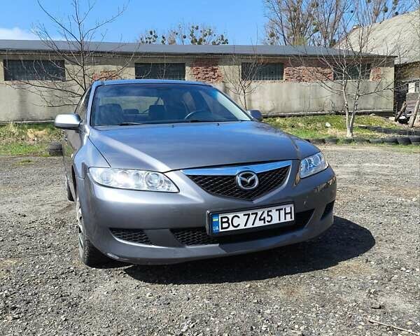 Сірий Мазда 6, об'ємом двигуна 2 л та пробігом 356 тис. км за 4200 $, фото 1 на Automoto.ua