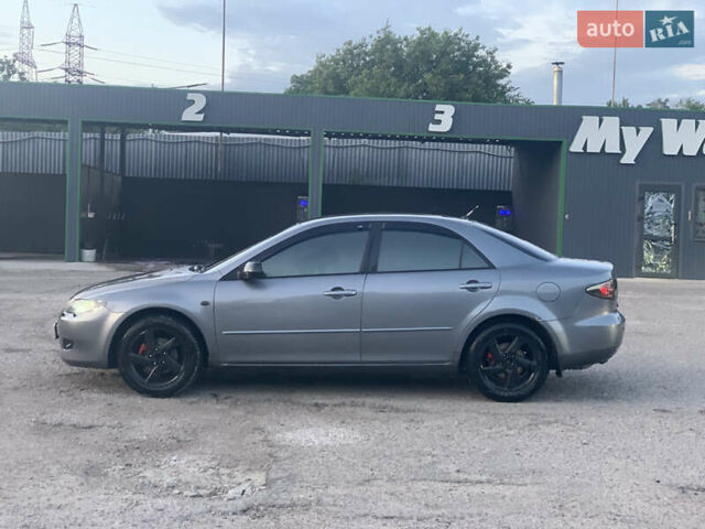 Серый Мазда 6, объемом двигателя 2 л и пробегом 310 тыс. км за 3500 $, фото 1 на Automoto.ua