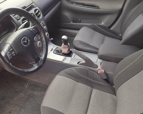 Серый Мазда 6, объемом двигателя 2 л и пробегом 205 тыс. км за 4300 $, фото 1 на Automoto.ua