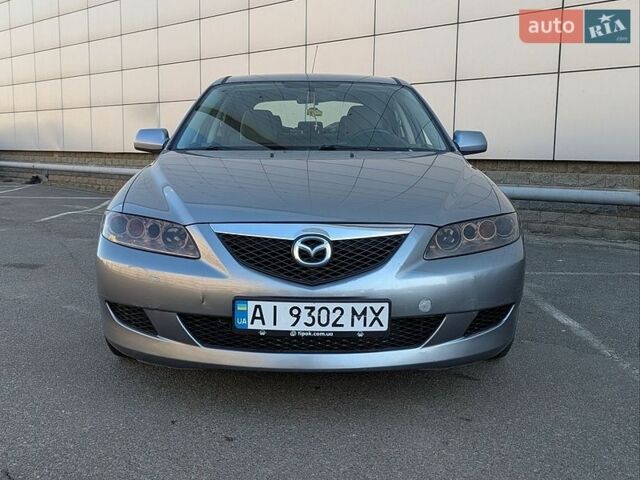 Серый Мазда 6, объемом двигателя 1.8 л и пробегом 267 тыс. км за 3300 $, фото 1 на Automoto.ua