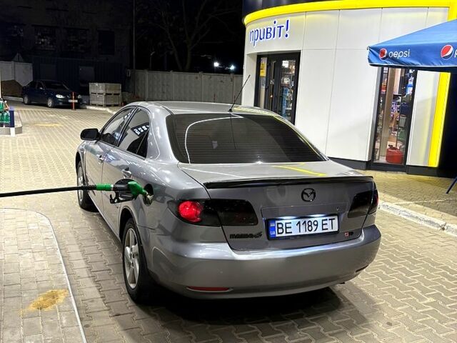 Серый Мазда 6, объемом двигателя 2 л и пробегом 250 тыс. км за 3950 $, фото 1 на Automoto.ua