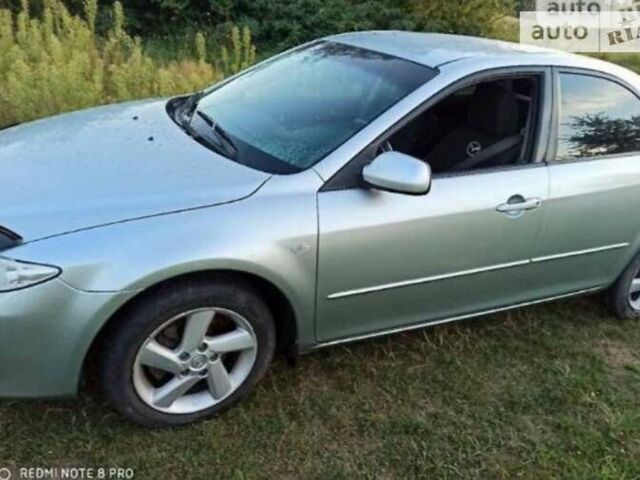 Серый Мазда 6, объемом двигателя 2 л и пробегом 230 тыс. км за 4200 $, фото 1 на Automoto.ua