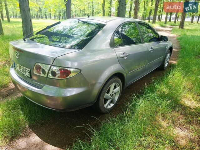 Серый Мазда 6, объемом двигателя 2 л и пробегом 319 тыс. км за 4100 $, фото 1 на Automoto.ua