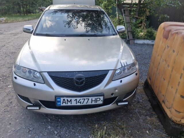 Серый Мазда 6, объемом двигателя 2 л и пробегом 430 тыс. км за 2466 $, фото 1 на Automoto.ua