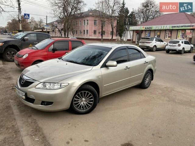 Серый Мазда 6, объемом двигателя 1.8 л и пробегом 218 тыс. км за 3800 $, фото 1 на Automoto.ua