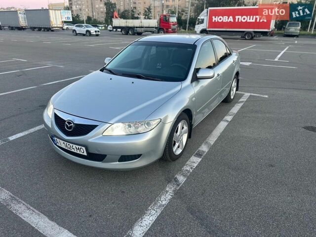 Серый Мазда 6, объемом двигателя 2 л и пробегом 154 тыс. км за 5000 $, фото 1 на Automoto.ua