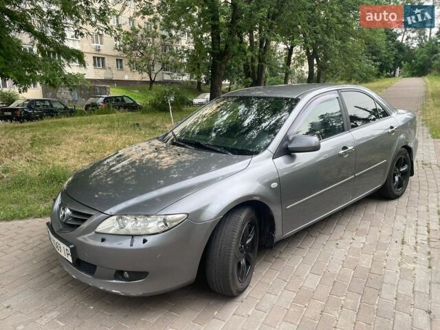 Серый Мазда 6, объемом двигателя 2 л и пробегом 242 тыс. км за 3700 $, фото 1 на Automoto.ua