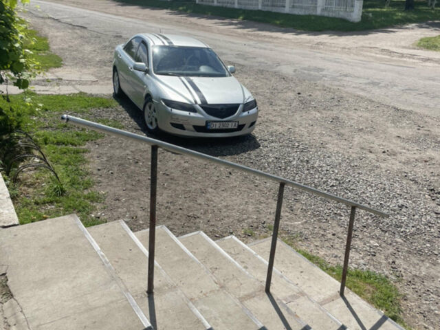 Серый Мазда 6, объемом двигателя 2 л и пробегом 199 тыс. км за 4350 $, фото 1 на Automoto.ua