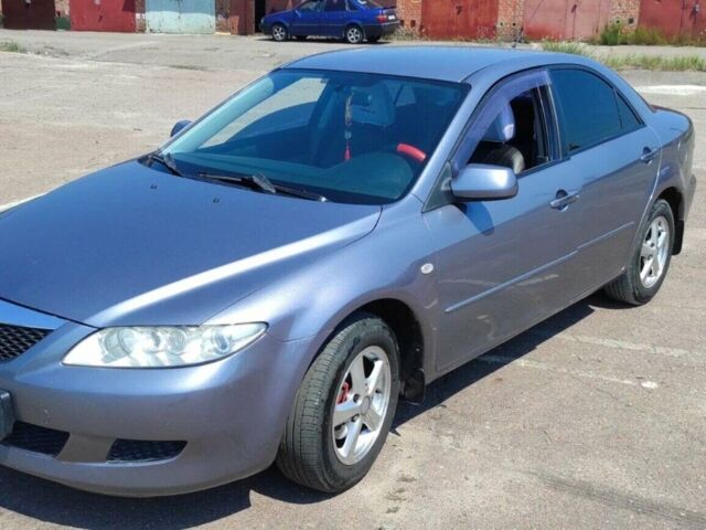 Серый Мазда 6, объемом двигателя 1.8 л и пробегом 252 тыс. км за 4850 $, фото 1 на Automoto.ua