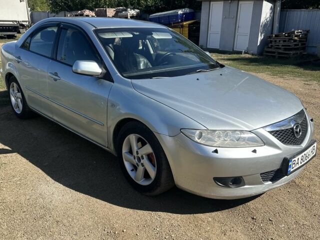 Серый Мазда 6, объемом двигателя 2 л и пробегом 255 тыс. км за 2551 $, фото 1 на Automoto.ua