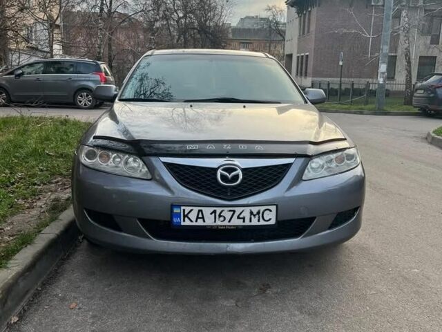 Серый Мазда 6, объемом двигателя 2 л и пробегом 288 тыс. км за 3500 $, фото 1 на Automoto.ua