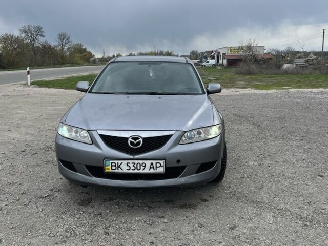 Серый Мазда 6, объемом двигателя 2 л и пробегом 280 тыс. км за 2200 $, фото 1 на Automoto.ua