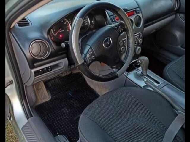 Серый Мазда 6, объемом двигателя 2 л и пробегом 230 тыс. км за 4200 $, фото 1 на Automoto.ua