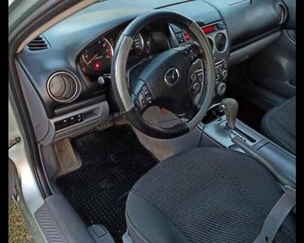 Серый Мазда 6, объемом двигателя 2 л и пробегом 230 тыс. км за 4200 $, фото 1 на Automoto.ua