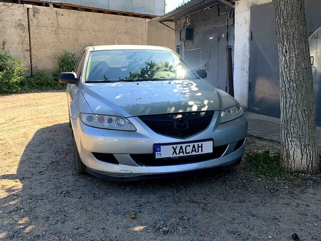 Серый Мазда 6, объемом двигателя 2 л и пробегом 330 тыс. км за 3000 $, фото 1 на Automoto.ua
