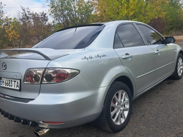 Серый Мазда 6, объемом двигателя 1.8 л и пробегом 268 тыс. км за 5200 $, фото 1 на Automoto.ua