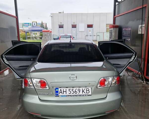 Серый Мазда 6, объемом двигателя 2 л и пробегом 317 тыс. км за 3000 $, фото 1 на Automoto.ua