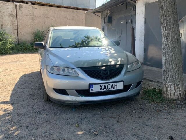 Серый Мазда 6, объемом двигателя 2 л и пробегом 330 тыс. км за 2850 $, фото 1 на Automoto.ua