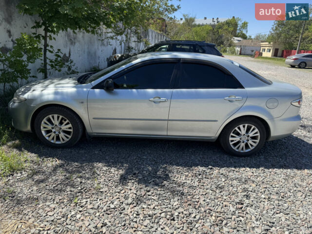 Серый Мазда 6, объемом двигателя 2 л и пробегом 274 тыс. км за 4000 $, фото 1 на Automoto.ua