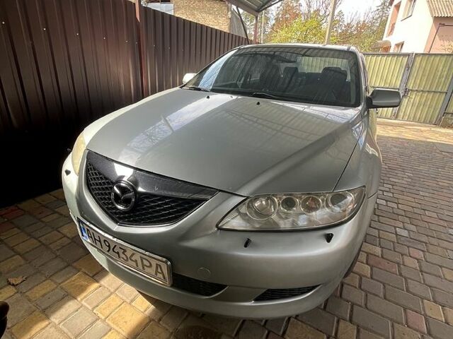 Серый Мазда 6, объемом двигателя 2 л и пробегом 290 тыс. км за 3700 $, фото 1 на Automoto.ua