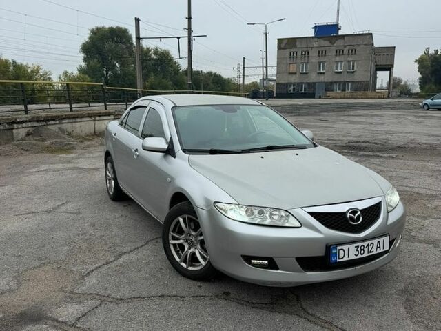 Серый Мазда 6, объемом двигателя 2 л и пробегом 334 тыс. км за 3500 $, фото 1 на Automoto.ua