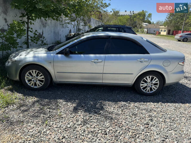 Сірий Мазда 6, об'ємом двигуна 2 л та пробігом 274 тис. км за 4600 $, фото 1 на Automoto.ua