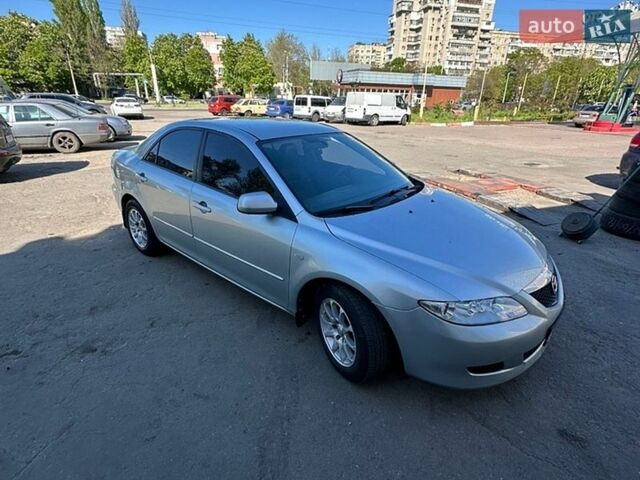 Серый Мазда 6, объемом двигателя 1.99 л и пробегом 125 тыс. км за 4000 $, фото 1 на Automoto.ua